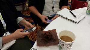 2 people texting on their phones